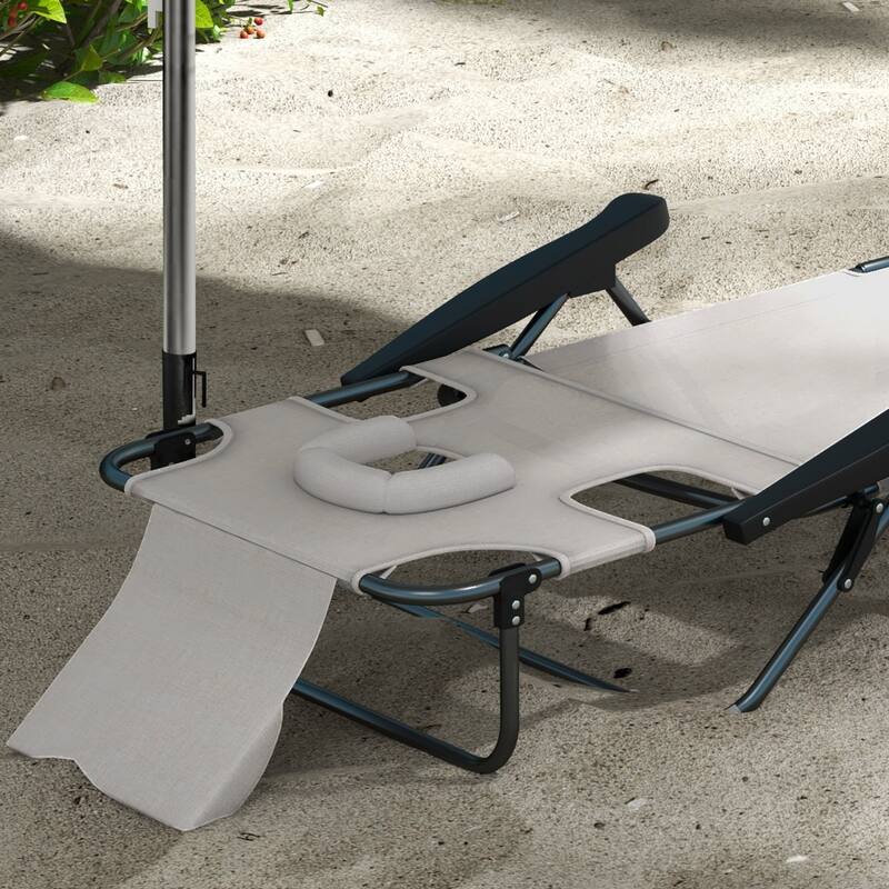 Folding sun loungers with face holes, arm slots and pillows