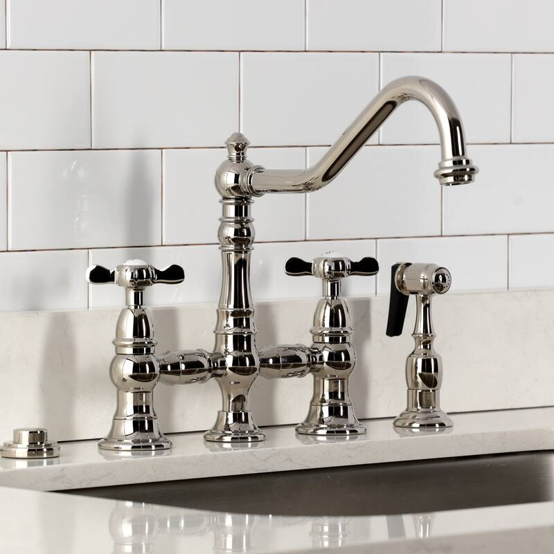 Kingston Brass Essex Two-Handle 4-Hole Deck Mount Bridge Kitchen Faucet with Brass Side Sprayer