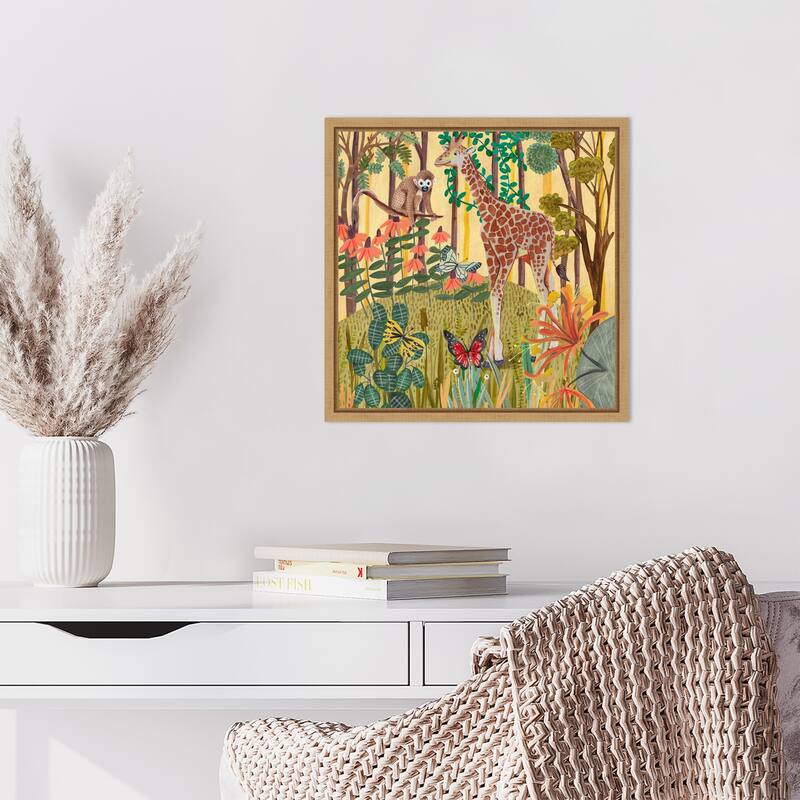 Giraffe in nature by Caroline Bonne Muller Framed Canvas Wall Art