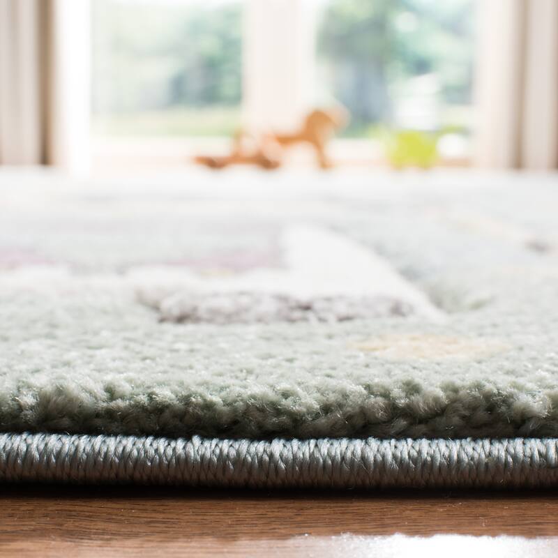 SAFAVIEH Carousel Kids Stojana Animal Rug