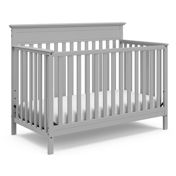 grey crib and changing table set