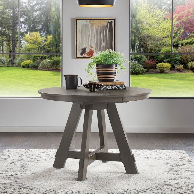Harstad Wood Finish Extendable Round Dining Table by iNSPIRE Q Modern