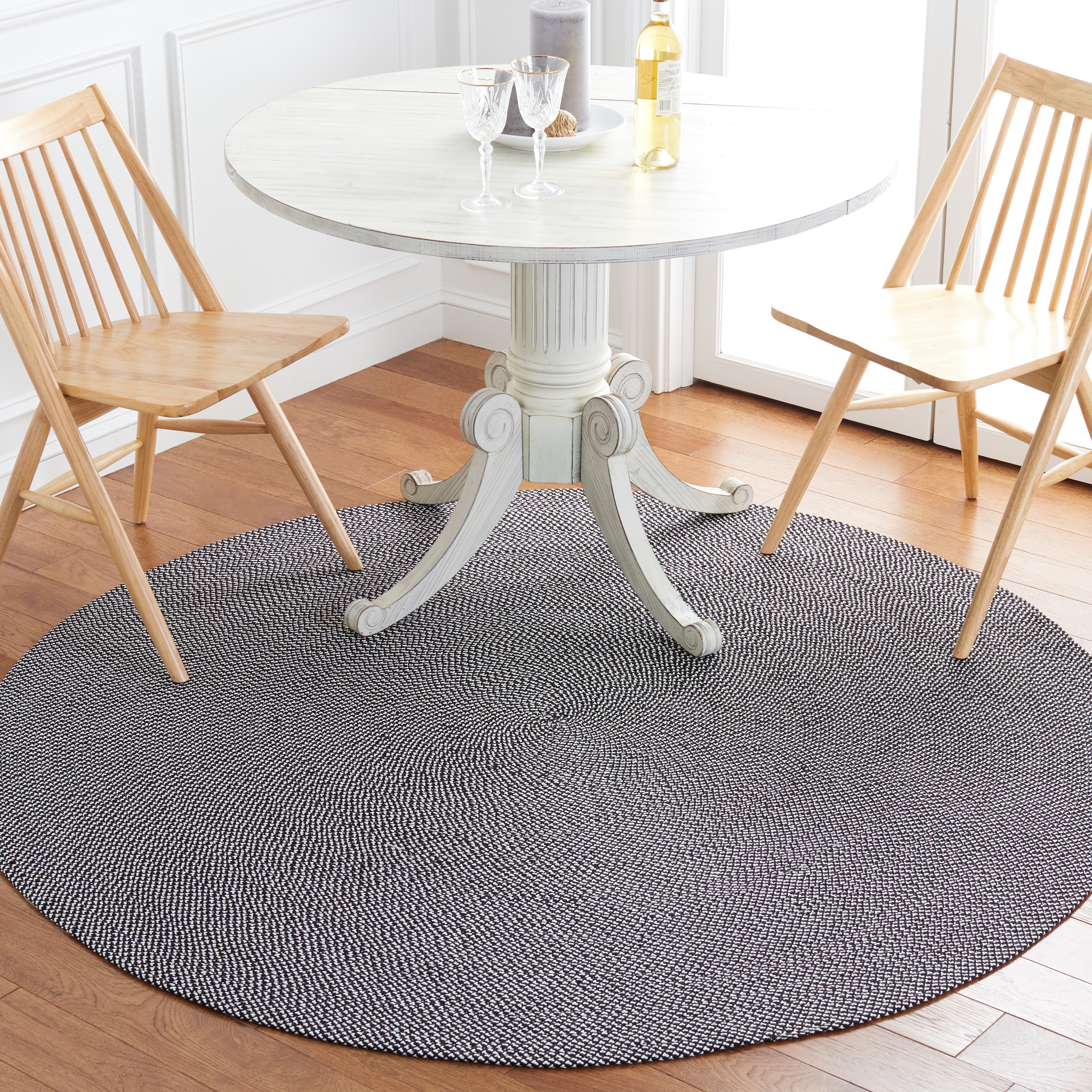 SAFAVIEH Handmade Braided Herminda Round Rug