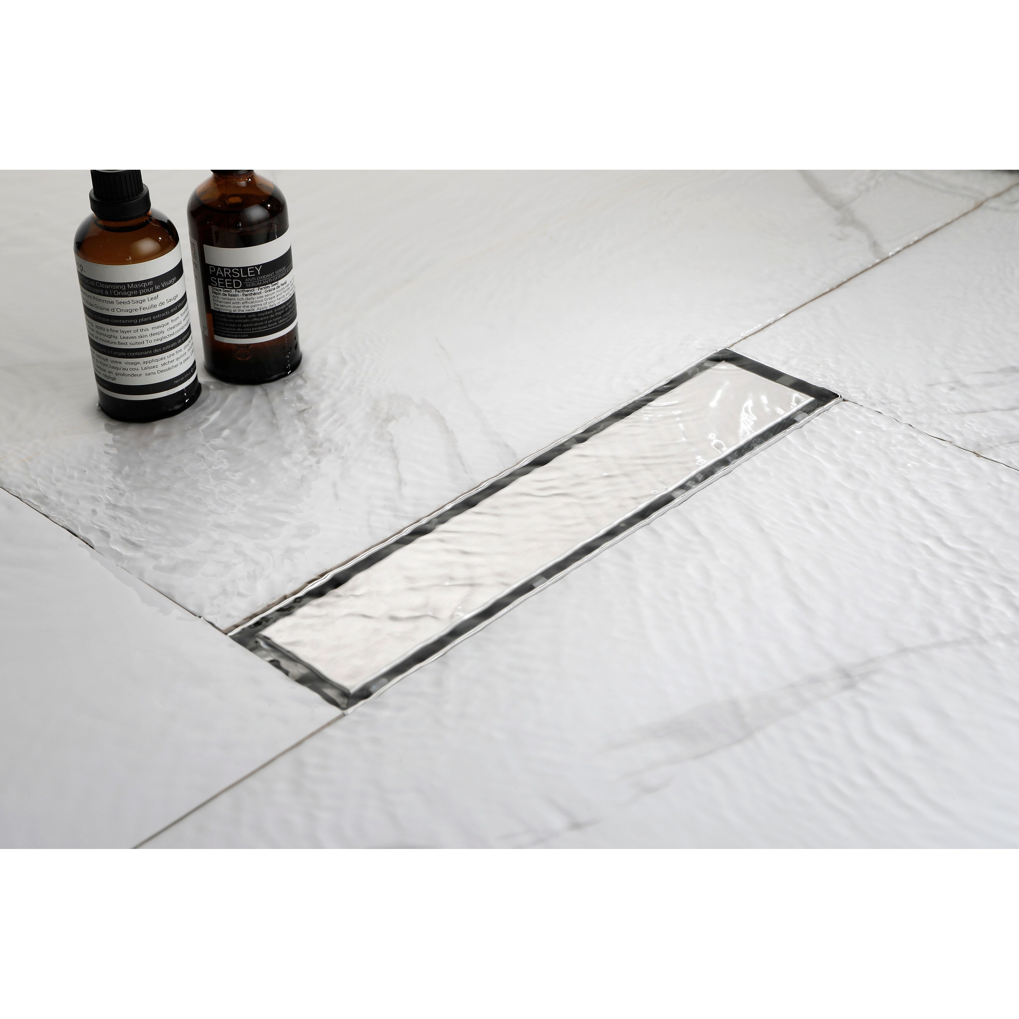 https://ak1.ostkcdn.com/images/products/is/images/direct/de70fb8cf90c719db78bd92f2d019a3b88087b2e/12-in-Square-Shower-Floor-Drain-with-Flange%2CFood-Grade-SUS-304-Stainless-Steel%2C-Pattern-Grate-Removable.jpg