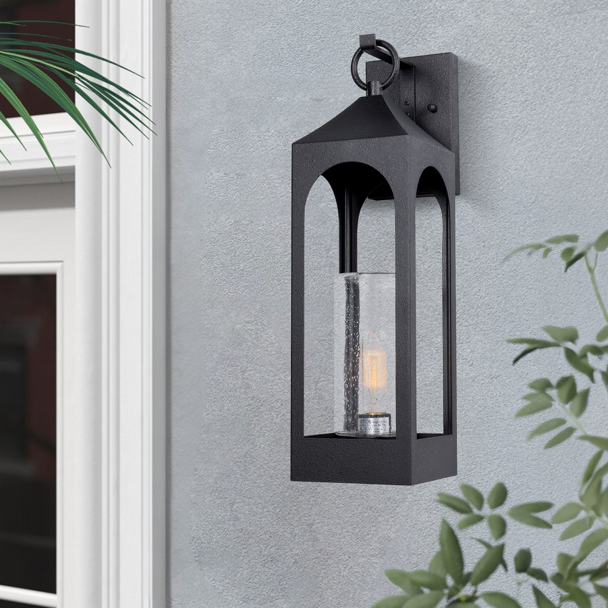 Seeded glass outdoor wall lantern top
