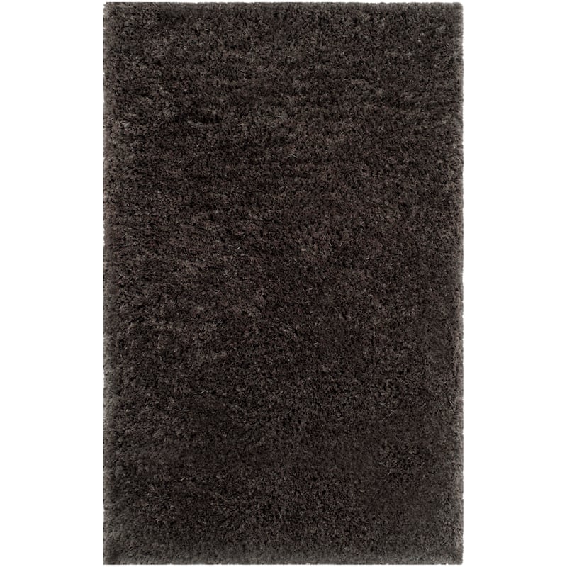 SAFAVIEH Handmade Ryann Shag Anneclaar Solid Polyester Rug