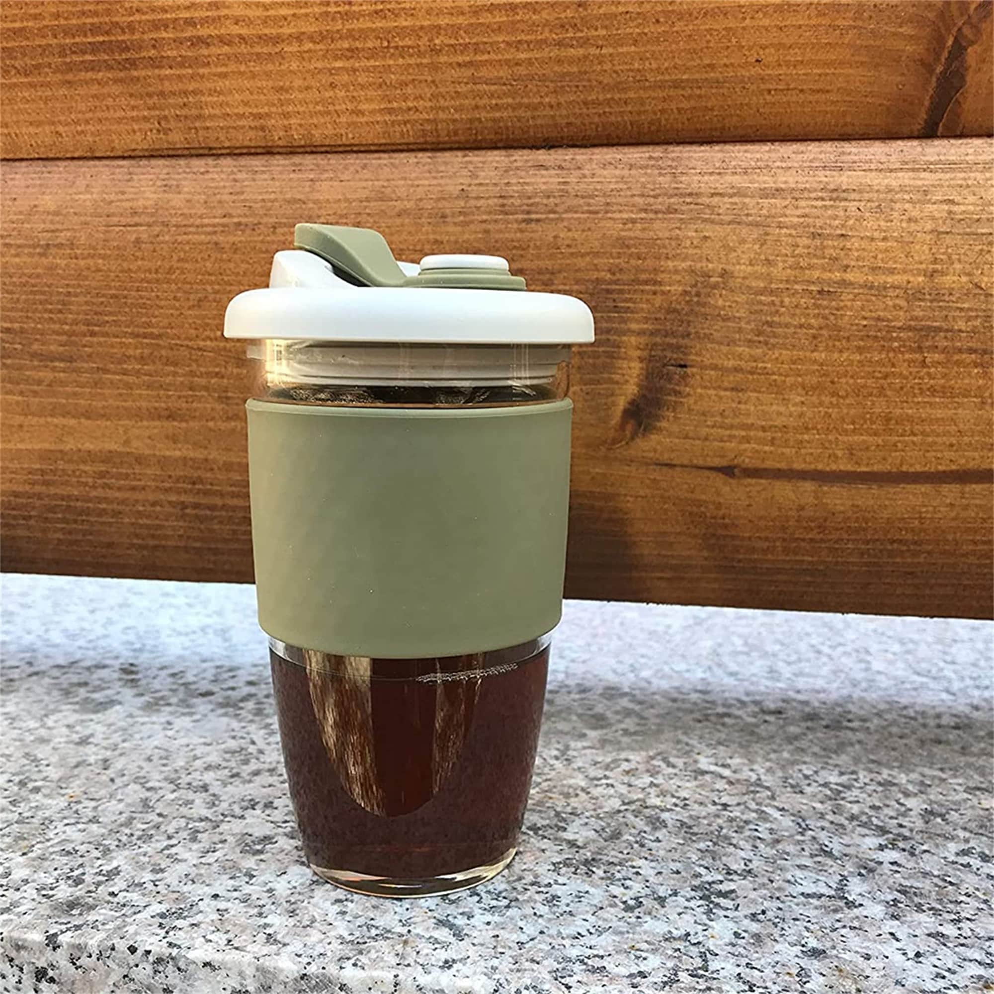 https://ak1.ostkcdn.com/images/products/is/images/direct/df2730ef4690a1f91be296a27ffb25e0ae8c359a/The-Reusable-Glass-Coffee-Cup%2C-ToGo-Travel-Coffee-Mug-with-Lid-and-Silicone-Sleeve%2C-Dishwasher-and-Microwave-Safe.jpg