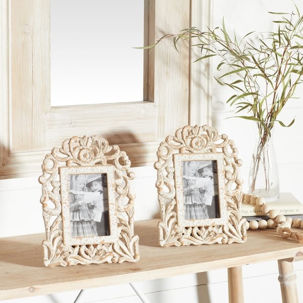 https://ak1.ostkcdn.com/images/products/is/images/direct/df4e44ff4e0e7c3c16c1b97b1cb509a3a418288b/White-MDF-Vintage-Photo-Frame-Family-%28Set-of-2%29.jpg?impolicy=medium