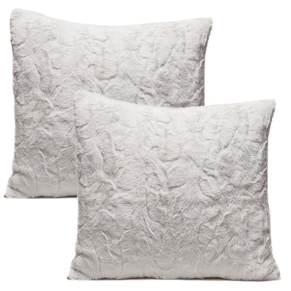 white fluffy throw pillows