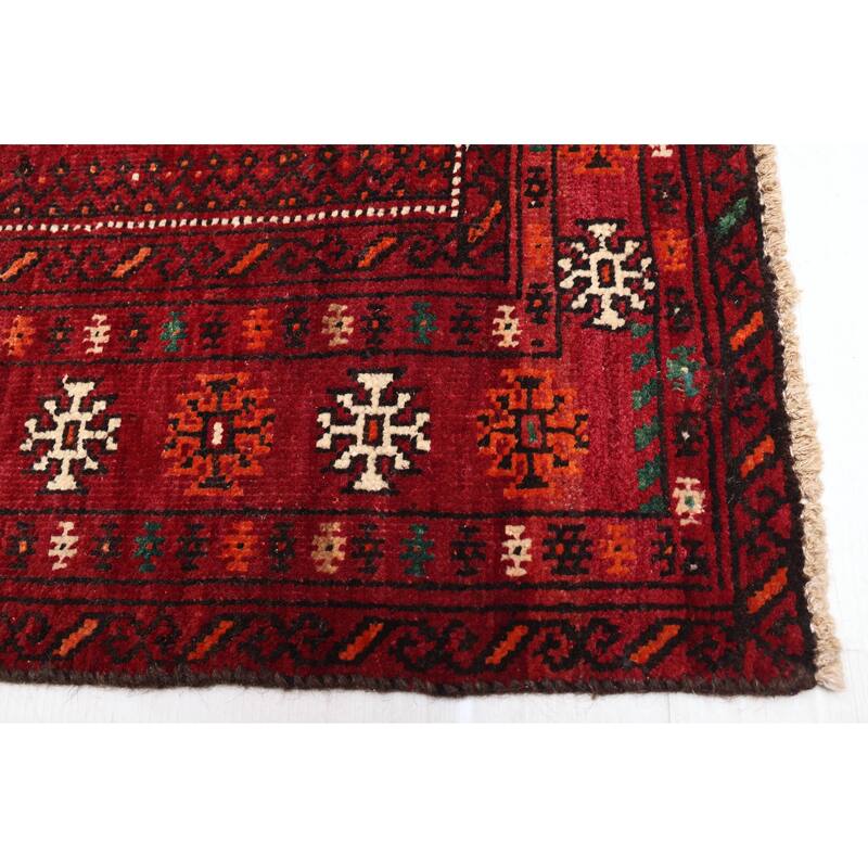 ECARPETGALLERY Hand-knotted Baluch Dark Red Wool Rug - 4'4 x 7'7