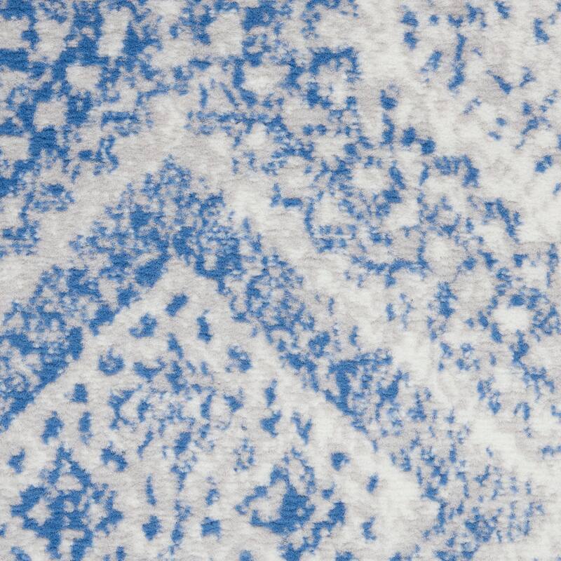Nourison Whimsicle Boho Distressed Tribal Ivory Blue Area Rug