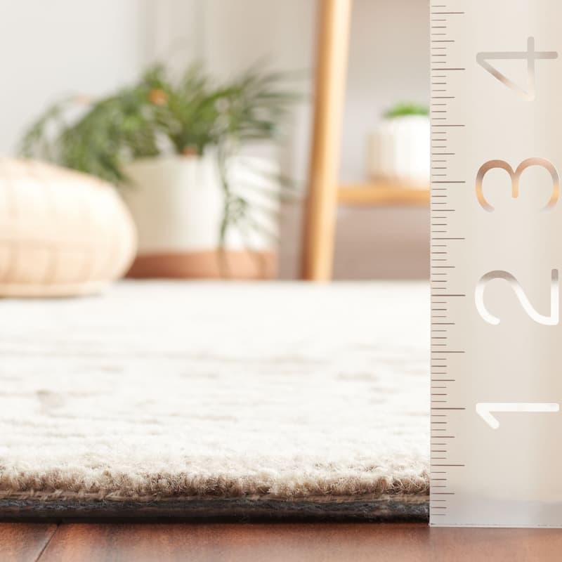 SAFAVIEH Handmade Ebony Cybil Modern Wool Rug