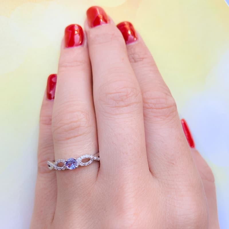 Miadora Sterling Silver Tanzanite and 1/10ct TDW Diamond Ring (H-I, I2-I3)