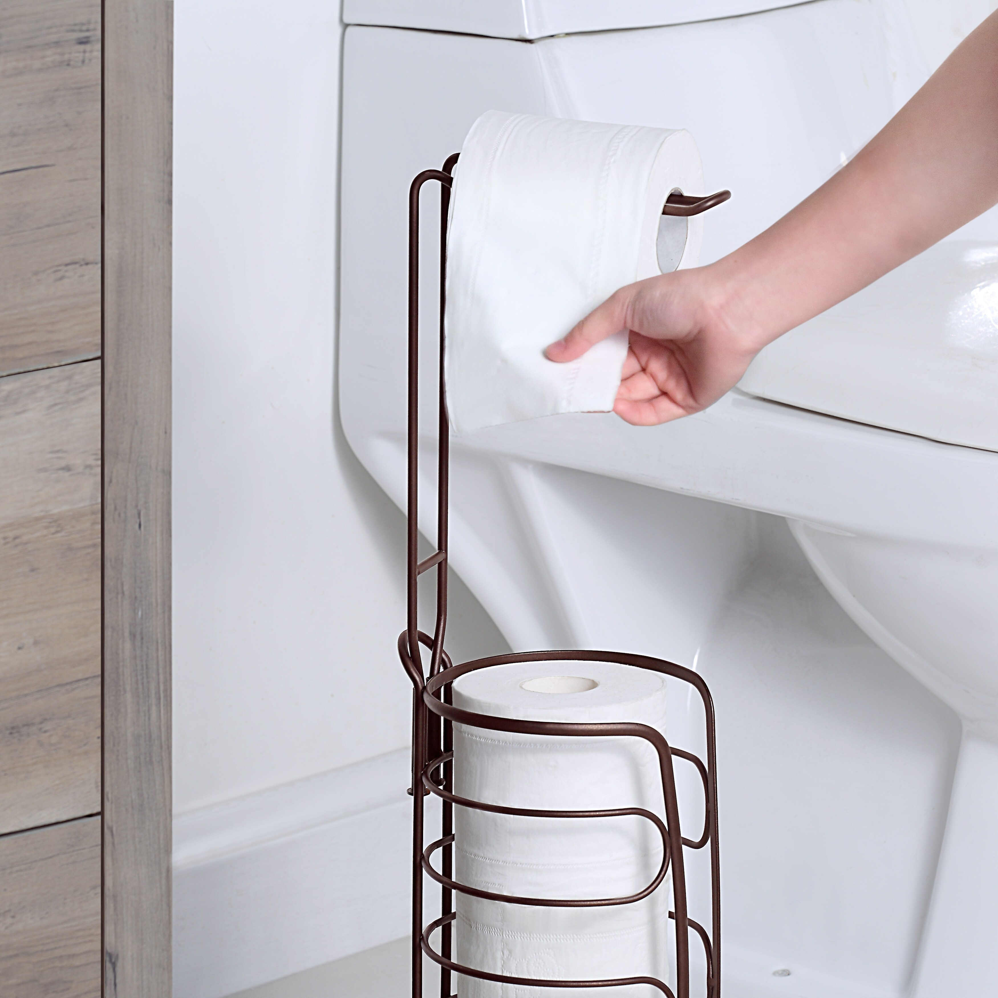 https://ak1.ostkcdn.com/images/products/is/images/direct/e00b2e33e21df08436ea4f8e259c9800876b6d40/SunnyPoint-Freestanding-3-roll-Storage-Toilet-Paper-Holder.jpg