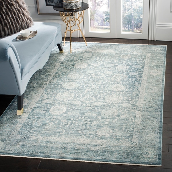 SAFAVIEH Illusion Estrella Vintage Boho Oriental Viscose Rug with Fringe. Opens flyout.