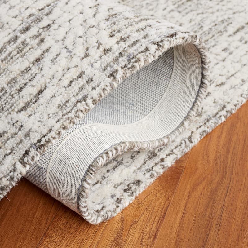 SAFAVIEH Handmade Ebony Fridbjorg Modern Wool Rug