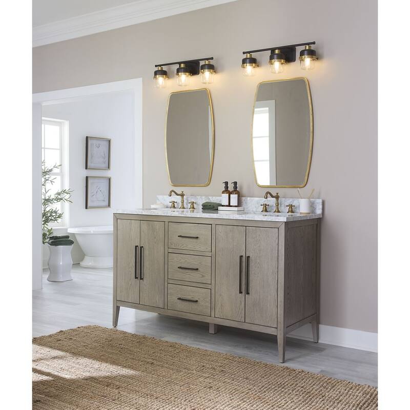Beckner Collection Three-Light Matte Black Clear Glass Urban Industrial Bath Light with Vintage Brass Accents