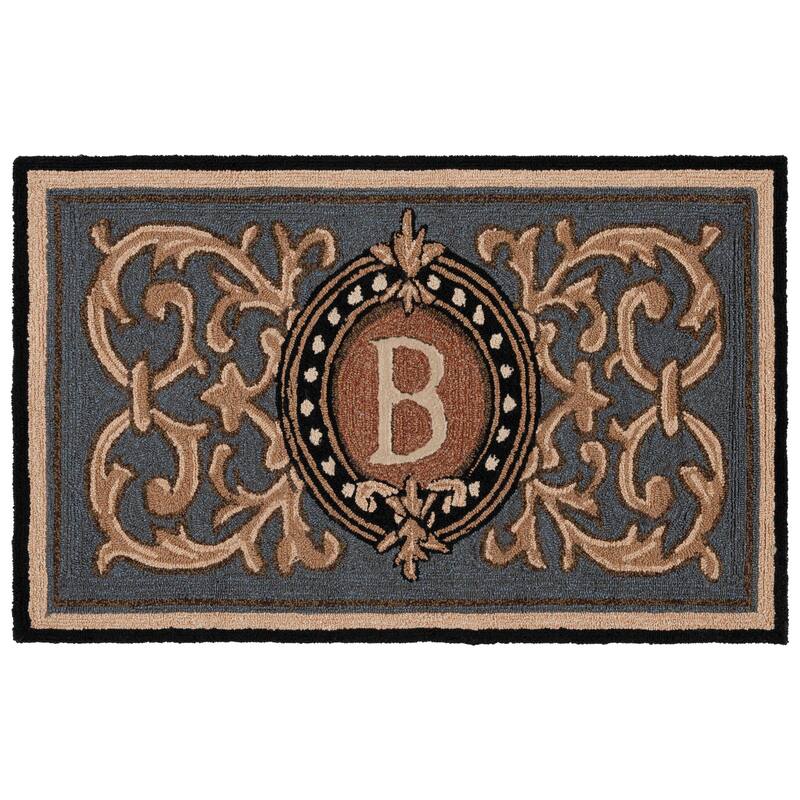 SAFAVIEH Handmade Monogram Griseldis Casual Rug
