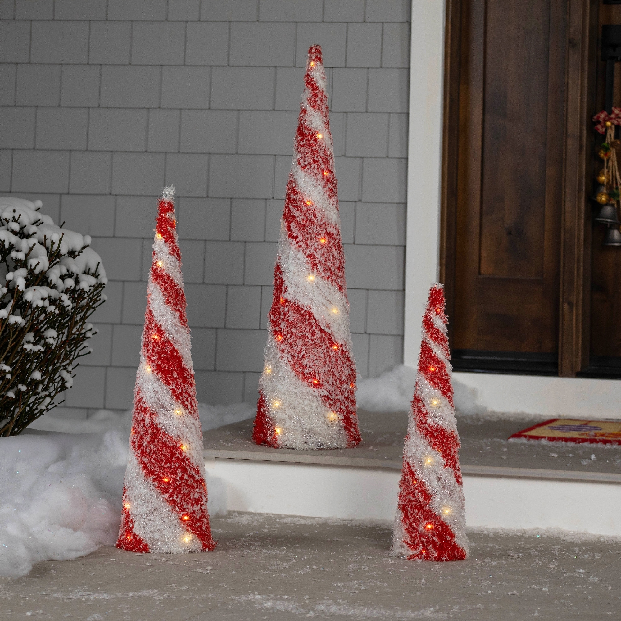 Set of 3 LED Lighted Snowy Cy Cane Striped Christmas Cone Trees 3.25'