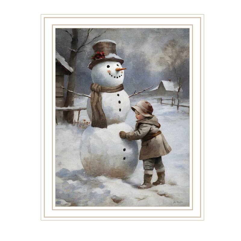 HomeRoots Boy Building A Snowman White Framed Wall Art