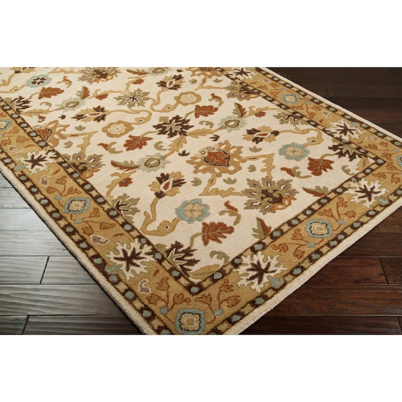 Handmade Nick Bordered Wool Area Rug
