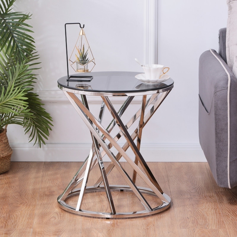 Small round glass top side outlet table