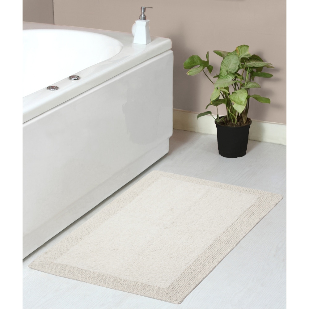 https://ak1.ostkcdn.com/images/products/is/images/direct/e0eeef9f753dc7a36d11ea6aaf0dd2acba386f48/Home-Weavers-Luxury-Collection-100%25-Cotton-Reversible-Bathroom-Washable-Rug-Soft-and-Absorbent-bath-Rug-Non-Slip.jpg