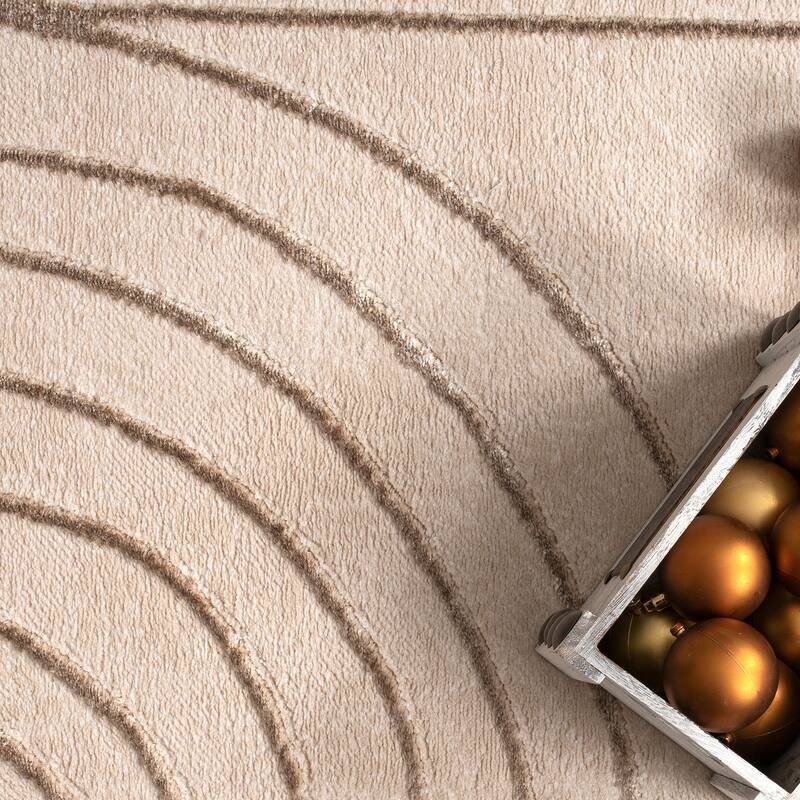 Elegant Area Rug with Carved Lines and Arch Pattern