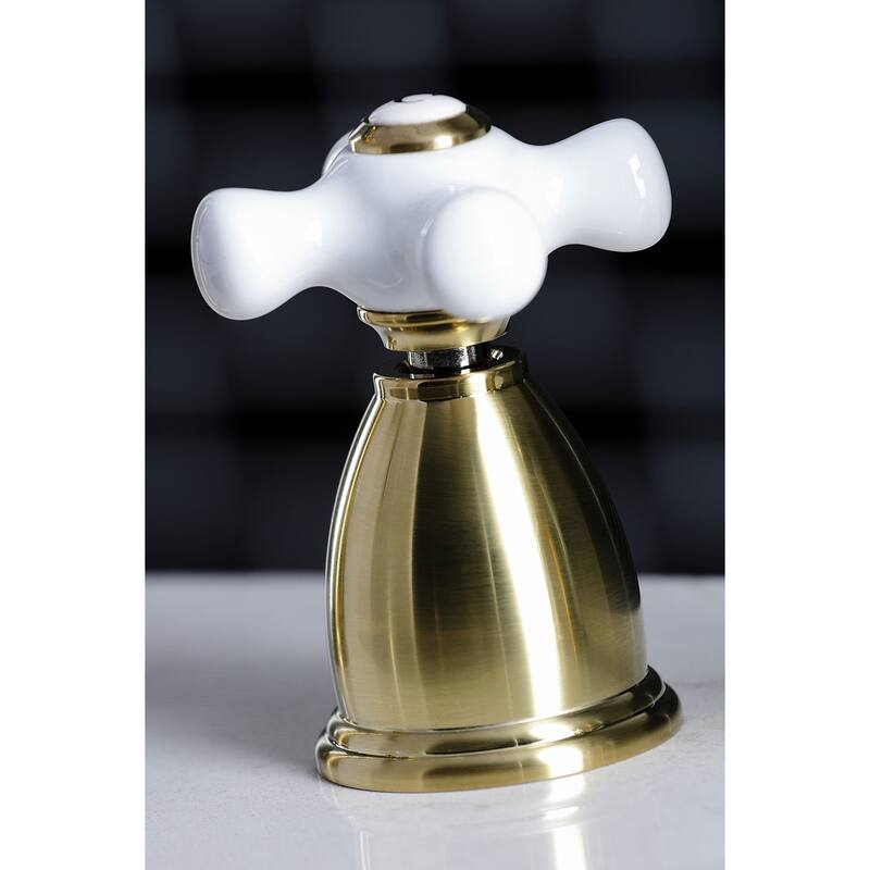 Kingston Brass Heritage Deck Mount Widespread Kitchen Faucet with Brass Sprayer
