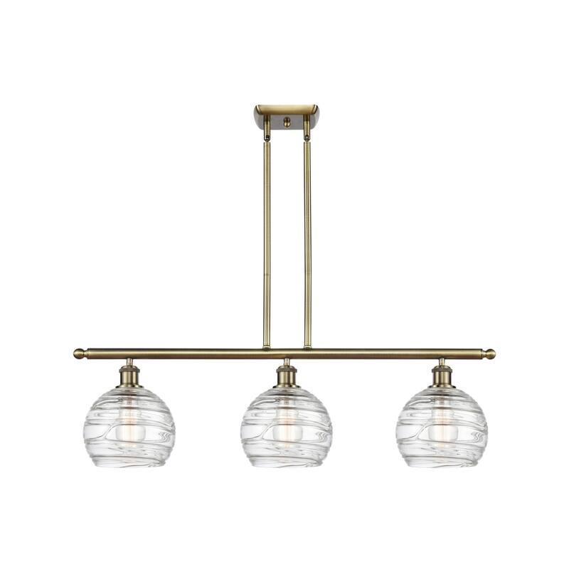 Innovations Lighting 516-3I-11-36 Athens Linear Athens 3 Light 36" - Antique Brass / Clear Deco Swirl
