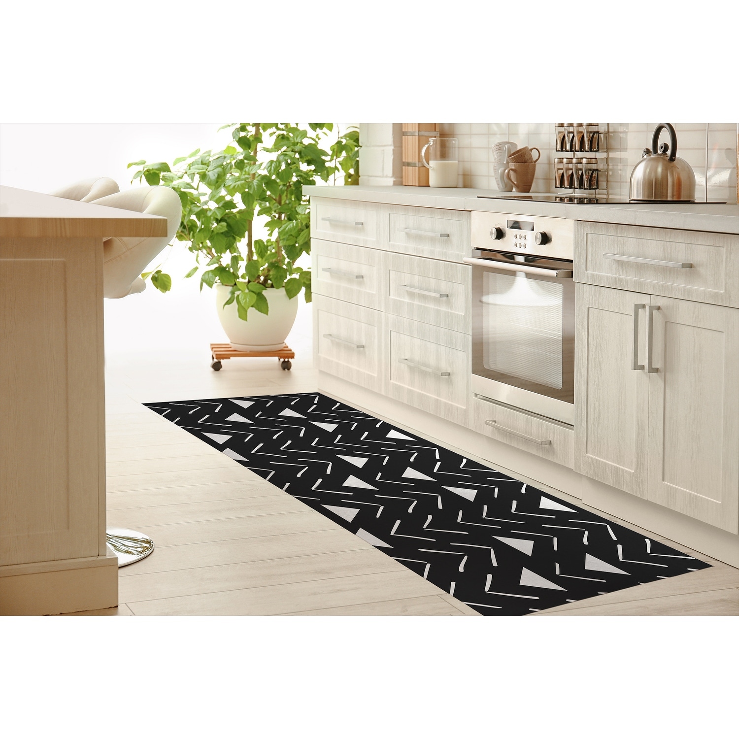 https://ak1.ostkcdn.com/images/products/is/images/direct/e10092a6641aed484fa870dd14ad4916e273809f/MUD-CLOTH-BW-Kitchen-Mat-By-Becky-Bailey.jpg