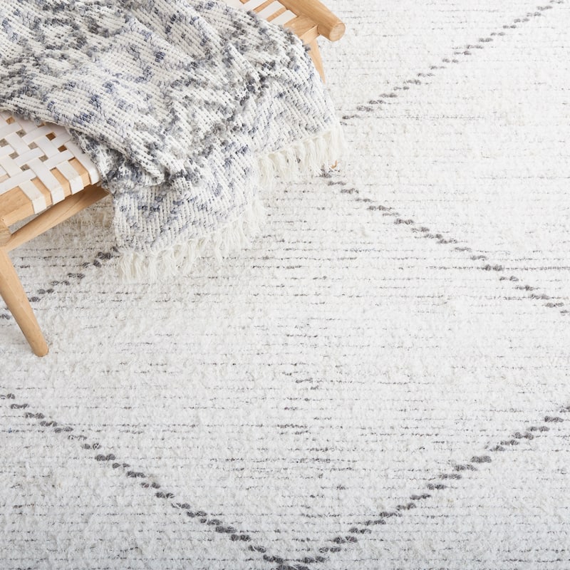 SAFAVIEH Handmade Casablanca Mukta Boho Cotton Fringe Rug