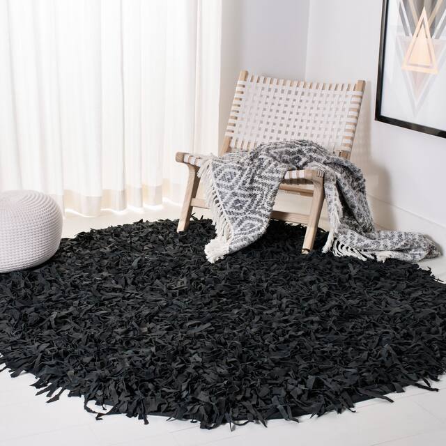 SAFAVIEH Handmade Leather Shag Carlijn Modern Decorative Rug - 6' x 6' Round - Black