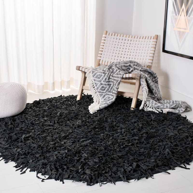SAFAVIEH Handmade Leather Shag Carlijn Modern Decorative Rug - 6' x 6' Round - Black