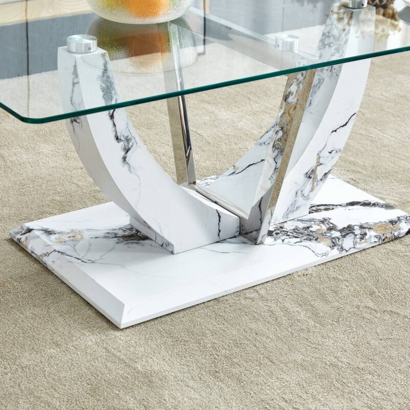 glass coffee table with marble patterned MDF legs and stainless steel decorative columns