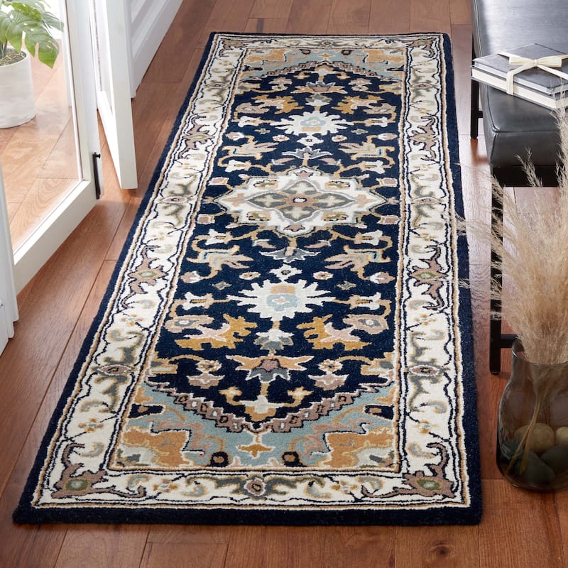 SAFAVIEH Handmade Heritage Carrol Traditional Oriental Wool Rug - 2' 3" x 12' - Navy/Ivory - Runner
