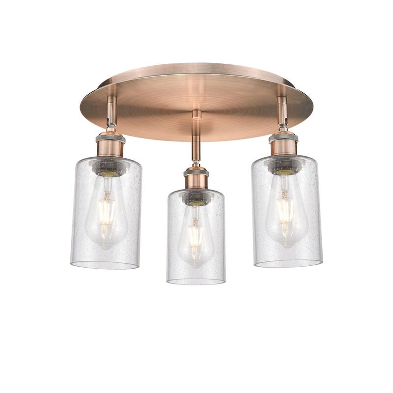 Innovations Lighting Clymer - 3 Light 16" Flush Mount - Antique Copper/Seedy
