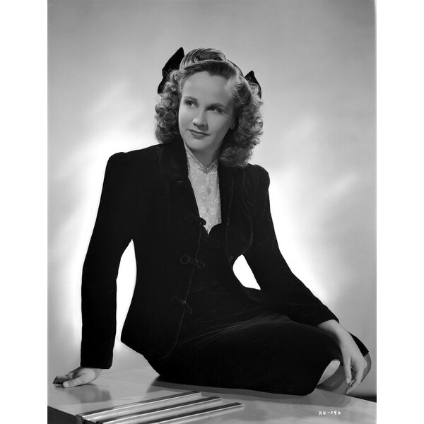 kim hunter on a long sleeve sitting on a table photo print kim hunter on a long sleeve sitting on a table photo print