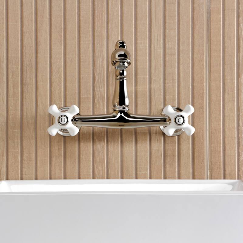 Kingston Brass English Country Two-Handle 2-Hole Wall Mount Bathroom Faucet