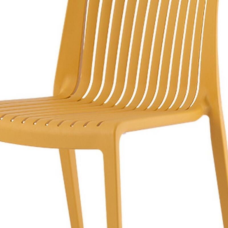 HomeRoots Set of Two Gold Heavy Duty Plastic Outdoor Stacking Accent Chairs