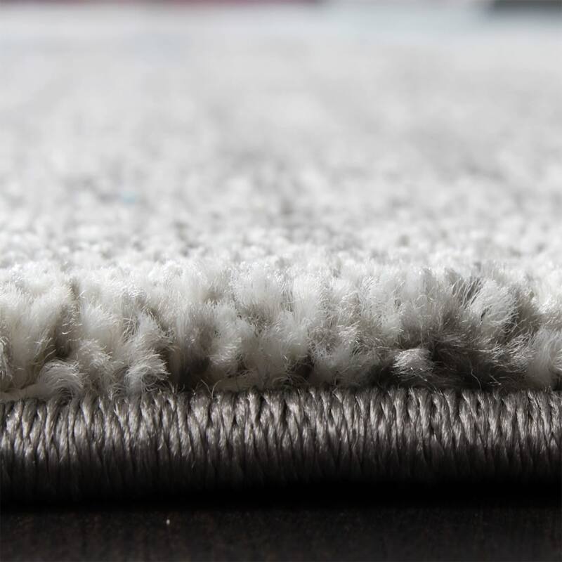 Artful Area Rug with Mottled Design Pattern in Grey