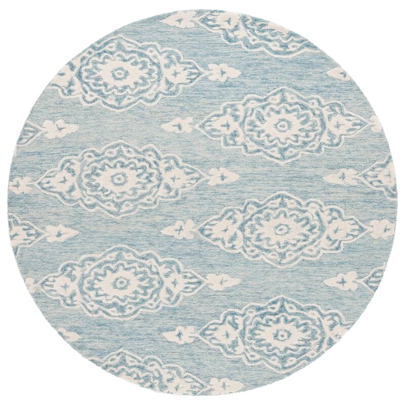 SAFAVIEH Handmade Ebony Ysaline Modern Wool Rug - 6' Round - Ivory/Light Blue