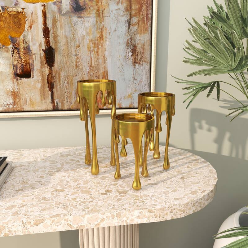 CosmoLiving by Cosmopolitan Silver, Gold or Black Aluminum Abstract Pillar Drip Candle Holder (Set of 3)