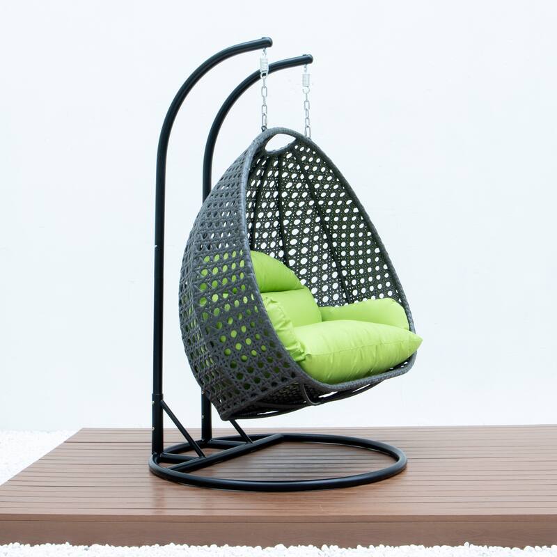 LeisureMod 2-Person Hanging Egg Swing Chair with Metal Stand - Handcrafted Charcoal Wicker, Patio Hammock Lounger with Cushions