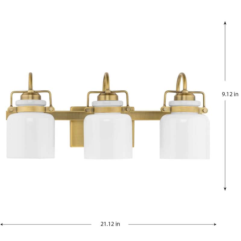 Fessler Collection Three-Light Vintage Brass Opal Glass Farmhouse Bath Light - 21.12 in x 7.12 in x 9.12 in