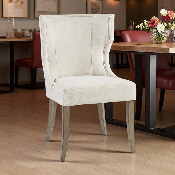 slide 2 of 7, 37.25"H Upholstered Polyester Wingback Dining Chair with Piping Detail and Solid Wood Legs Cream