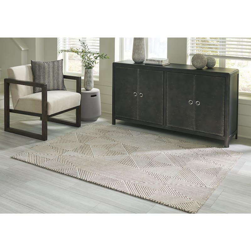 Signature Design by Ashley Jadott Beige/Brown Rug - 61.5" W x 84.5" D x 0.75" H
