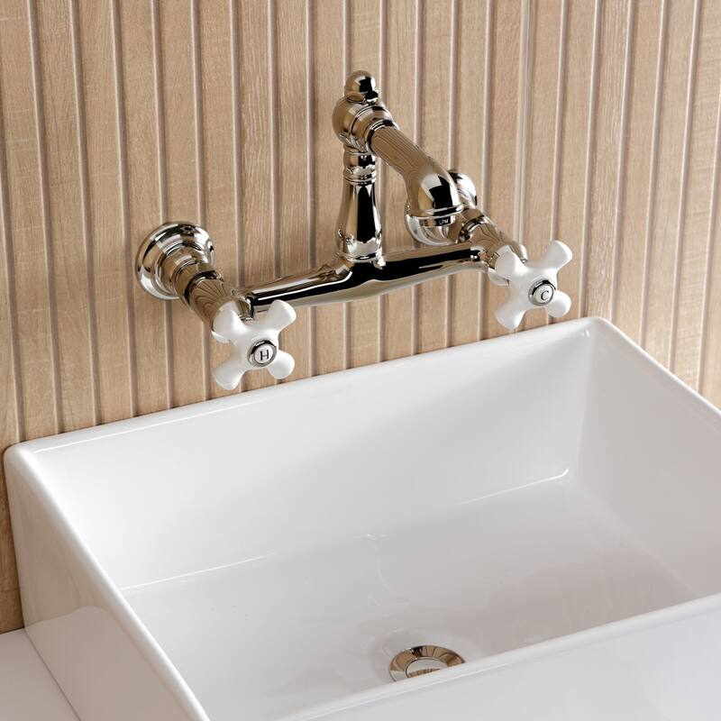 Kingston Brass English Country Two-Handle 2-Hole Wall Mount Bathroom Faucet