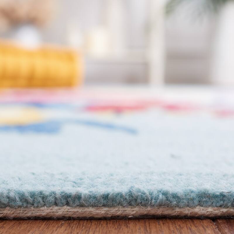 SAFAVIEH Handmade Chelsea Astronomy Floral Wool Rug