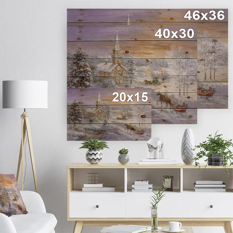 Designart 'Holiday Worship winter scene with sleigh and church' Print on Natural Pine Wood - Orange